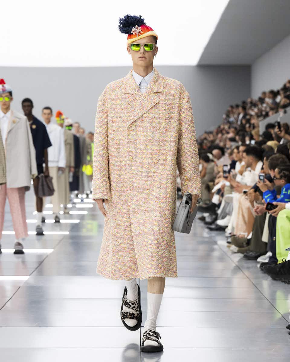 Tyler, the Creator riding through Louis Vuitton fashion show on a