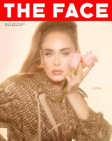 The Face magazine's Adele cover. Wearing a brown Burberry dress and holding pink roses. Shot by Charlotte Wales. Published in November 2021.