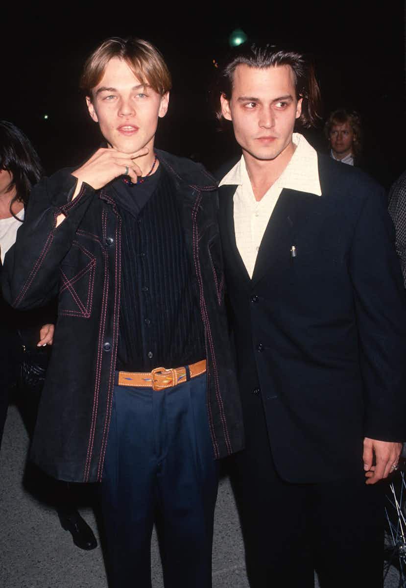 Actor Leonardo DiCaprio and actor Johnny Depp attend What’s Eating Gilbert Grape Los Angeles Premiere on December 12, 1993 at Paramount Theatre in Los Angeles, California.