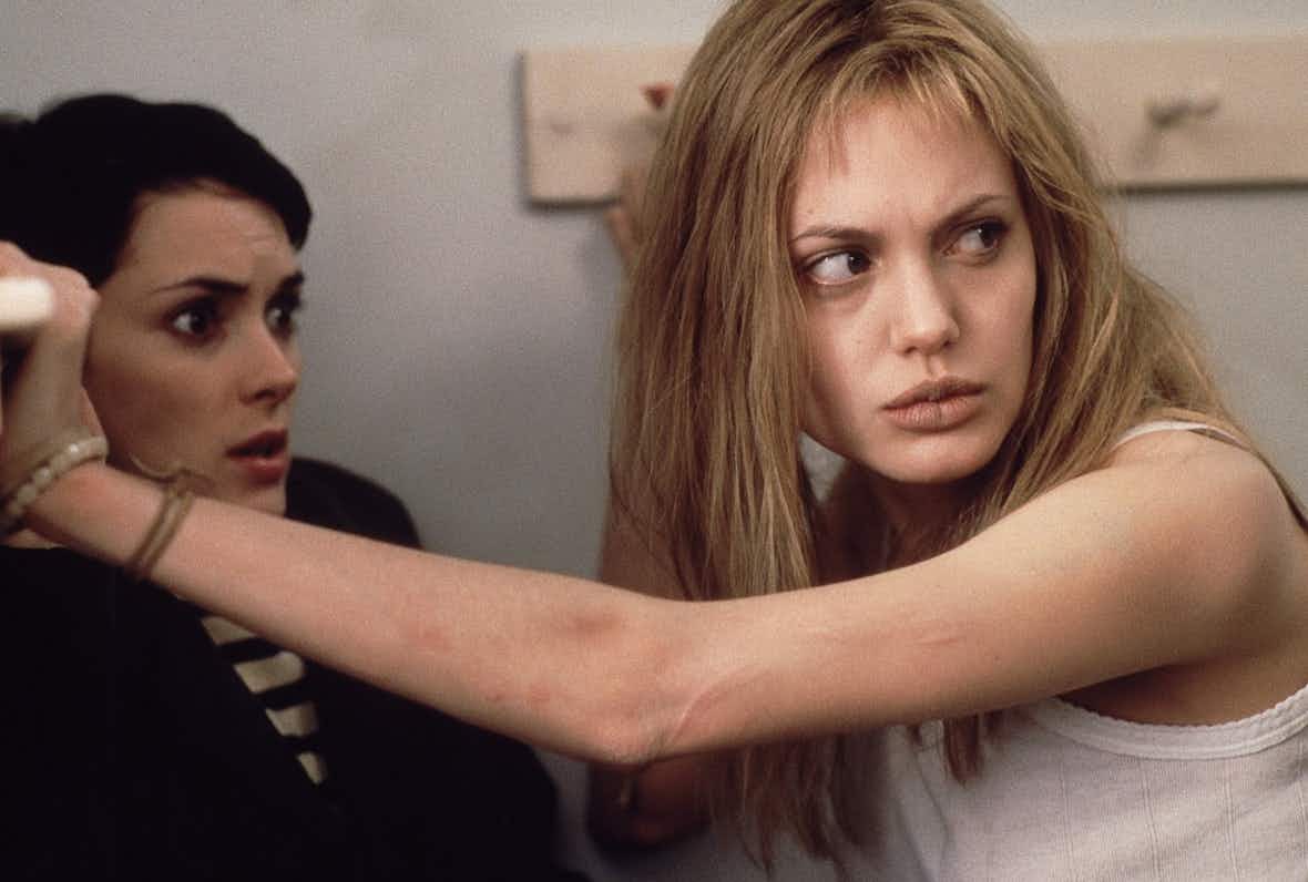 https://images.thefacecdn.com/images/girl-interrupted-07_winona_angelina_blogspot.jpg?auto=compress&q=25&fit=crop&crop=focalpoint&fp-x=0.5&fp-y=0.5&w=1180
